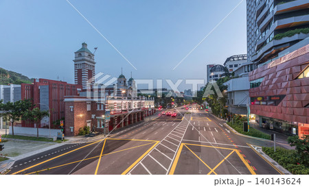 Street traffic near the fire station of Singapore night to day aerial timelapse. Street traffic near the fire station of Singapore night to day aerial timelapse. 140143624