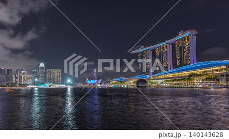 Beautiful laser and musical fountain show at the Marina Bay Sands waterfront in Singapore night timelapse 140143628