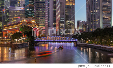 Singapore skyscrapers skyline with white Anderson Bridge near esplanade park day to night timelapse. Singapore skyscrapers skyline with white Anderson Bridge near esplanade park day to night timelapse. 140143644