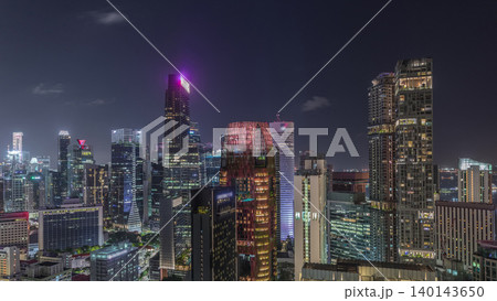 Aerial cityscape of Singapore downtown of modern architecture with skyscrapers night timelapse Aerial cityscape of Singapore downtown of modern architecture with skyscrapers night timelapse 140143650