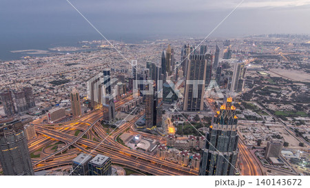 Downtown of Dubai night timelapse before sunrise. Aerial view with towers and skyscrapers Downtown of Dubai night timelapse before sunrise. Aerial view with towers and skyscrapers 140143672