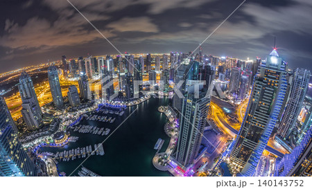 Dubai Marina skyscrapers and jumeirah lake towers view from the top aerial night timelapse in the United Arab Emirates. 140143752