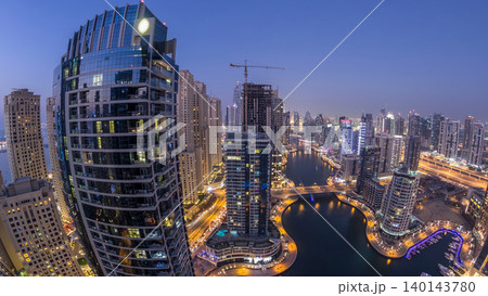 Beautiful aerial top view day to night transition timelapse of Dubai Marina canal Beautiful aerial top view day to night transition timelapse of Dubai Marina canal 140143780