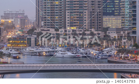 Beautiful aerial top view day to night transition timelapse of Dubai Marina canal Beautiful aerial top view day to night transition timelapse of Dubai Marina canal 140143793