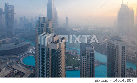 Foggy morning in downtown of Dubai night to day timelapse. Foggy morning in downtown of Dubai night to day timelapse. 140143807