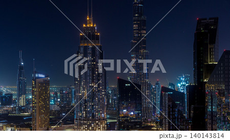 Dubai downtown skyline night timelapse with tallest building and Sheikh Zayed road traffic, UAE Dubai downtown skyline night timelapse with tallest building and Sheikh Zayed road traffic, UAE 140143814