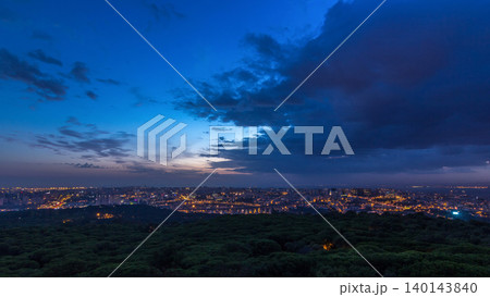 Panoramic view over Lisbon and Almada from a viewpoint in Monsanto night to day timelapse. Panoramic view over Lisbon and Almada from a viewpoint in Monsanto night to day timelapse. 140143840
