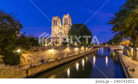 Front view of Notre Dame De Paris cathedral day to night timelapse after sunset. Front view of Notre Dame De Paris cathedral day to night timelapse after sunset. 140143852