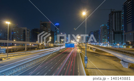 Sheikh Zayed road traffic day to night timelapse and Dubai Metro. Dubai, UAE. 140143881