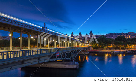 View of pont de Bir-Hakeim day to night timelapse - a bridge that crosses the Seine River. Paris, France View of pont de Bir-Hakeim day to night timelapse - a bridge that crosses the Seine River. Paris, France 140143910