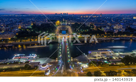 Aerial view over Trocadero day to night timelapse with the Palais de Chaillot seen from the Eiffel Tower in Paris, France. 140143919