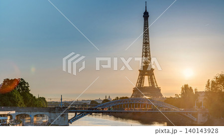 Eiffel Tower sunrise timelapse with boats on Seine river and in Paris, France. 140143928