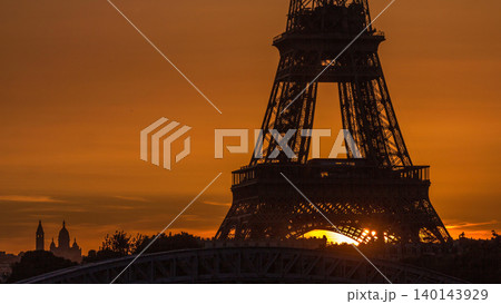 Eiffel Tower sunrise timelapse with boats on Seine river and in Paris, France. 140143929