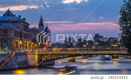 Le Pont D'Arcole bridge after sunset with boats day to night timelapse, Paris, France, Europe 140143935