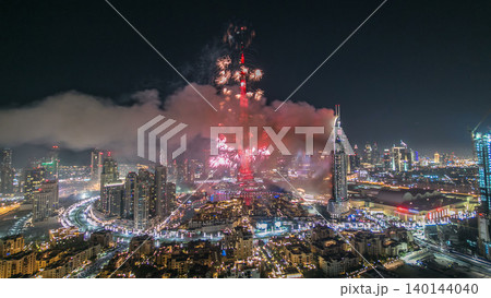 Dubai Burj Khalifa New Year fireworks celebration timelapse and the Fire accident at Dubai, UAE. 140144040