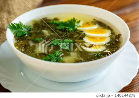 Ukrainian green borscht with sliced boiled eggs Ukrainian green borscht with sliced boiled eggs 140144879