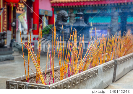 Incense Sticks in Front of a Buddhist Temple 140145248