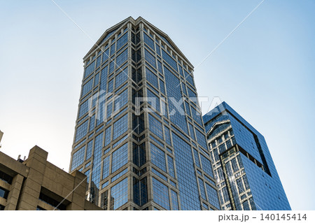 City architecture. Architecture of modern business office building. Perspective city skyscraper. Business skyscraper building. Architectural building. Glass skyscraper City architecture. Architecture of modern business office building. Perspective city skyscraper. Business skyscraper building. Architectural building. Glass skyscraper 140145414