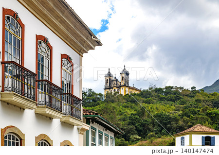 Houses and churches nestled among the hills Houses and churches nestled among the hills 140147474