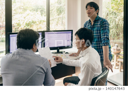Programmers team working in a software developing. Developing programming and coding technologies. Website design. Cyber space concept. Programmers team working in a software developing. Developing programming and coding technologies. Website design. Cyber space concept. 140147643