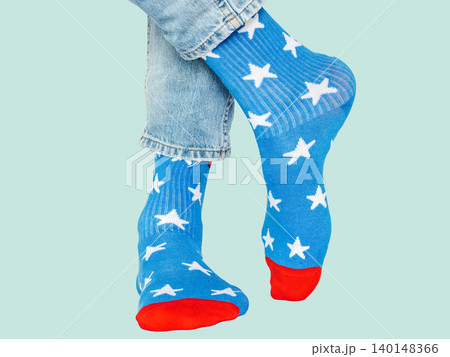 Men's legs and blue socks with white stars 140148366