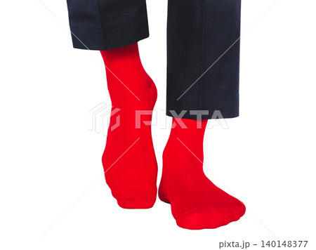 Man wearing bright red socks with black pants Man wearing bright red socks with black pants 140148377
