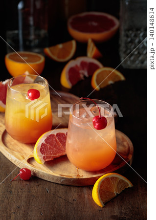 Summer cocktails with grapefruit and orange juice. Summer cocktails with grapefruit and orange juice. 140148614