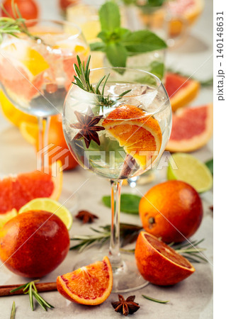 Refreshing summer cocktails with citrus on a white marble table. 140148631
