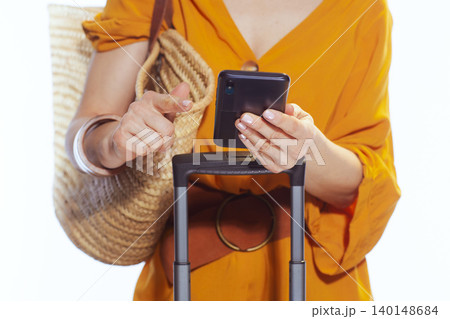 Close-up of Traveler Using Smartphone for Vacation Planning Close-up of Traveler Using Smartphone for Vacation Planning 140148684