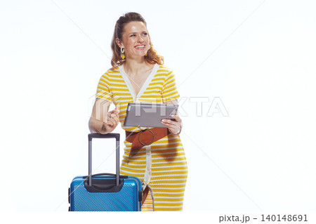 Expectant Female Traveler with Luggage and Digital Tablet Expectant Female Traveler with Luggage and Digital Tablet 140148691