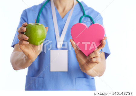 Heart Health and Nutrition Concept with Medical Professional Heart Health and Nutrition Concept with Medical Professional 140148757
