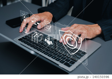 Intellectual Property Protection and Copyright Law Concept. business person using laptop with copyright shield, legal scale, patent, trademark, contract, compliance, and risk inspection icons. 140150396