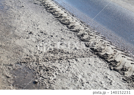 traces of car treads on mud on the road traces of car treads on mud on the road 140152231