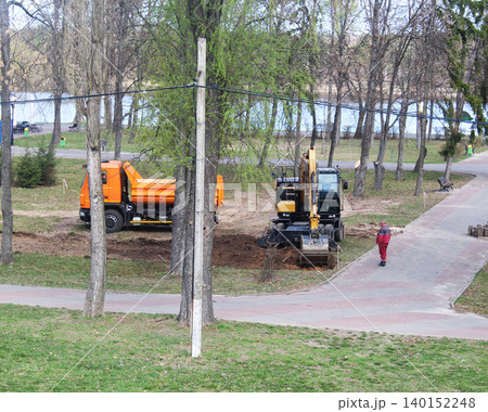 excavator digging trench hole for construction 140152248