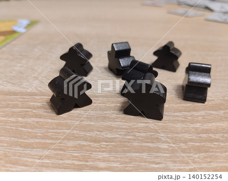 black meeples. Close-up of the player's chips black meeples. Close-up of the player's chips 140152254