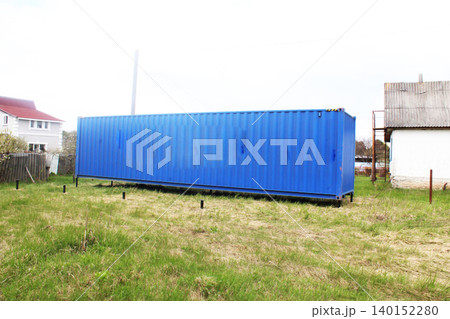blue shipping container on a plot of land blue shipping container on a plot of land 140152280