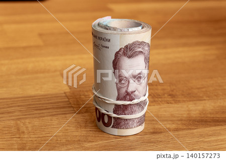 1000 Ukrainian hryvnia banknotes roll tied with rubber band 1000 Ukrainian hryvnia banknotes roll tied with rubber band 140157273