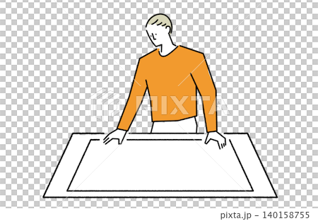 A man with large documents spread out on his desk. A man with large documents spread out on his desk. 140158755