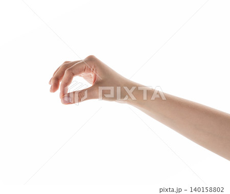 Female hand pick something isolated on white Female hand pick something isolated on white 140158802