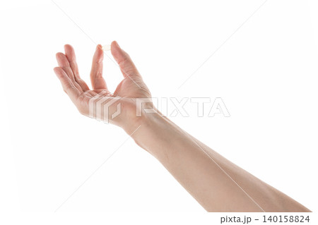 Male hand hold transparent pill isolated on white Male hand hold transparent pill isolated on white 140158824