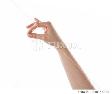 Female hand pick something isolated on white Female hand pick something isolated on white 140158828