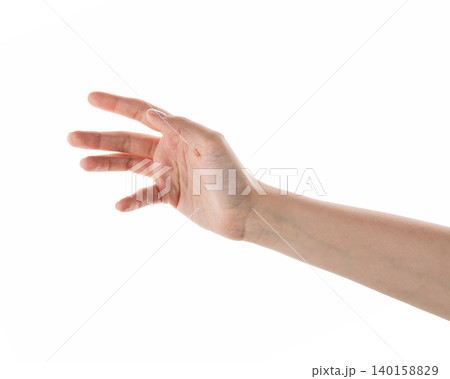 Female hand reaching something isolated on white Female hand reaching something isolated on white 140158829