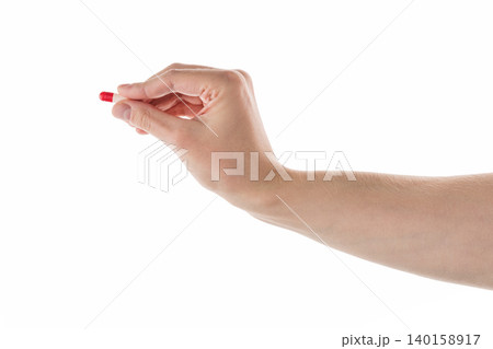 Male hand show red and white pills isolated on white 140158917