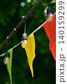 Outdoor string lights with colorful party flags 140159299