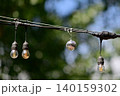 Outdoor string lights with small disco ball 140159302