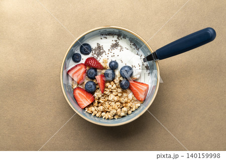 Healthy breakfast bowl yogurt berries granola Healthy breakfast bowl yogurt berries granola 140159998
