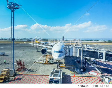 Top view on aircraft in Denpasar Ngurah Rai Airport Top view on aircraft in Denpasar Ngurah Rai Airport 140161548