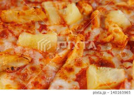 Traditional Hawaiian Pizza with Cheese, Poultry and Tropical Fruit Traditional Hawaiian Pizza with Cheese, Poultry and Tropical Fruit 140163965