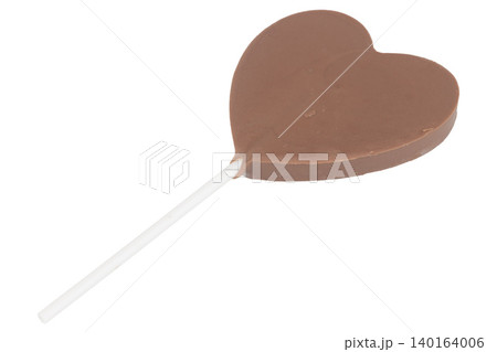 Heart-shaped chocolate on a stick isolated on white background Heart-shaped chocolate on a stick isolated on white background 140164006