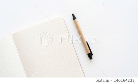 Clean minimalist notebook with pen on white surface notebook stationery minimalist top-view background workspace creative education business professional organization inspiration planning Clean minimalist notebook with pen on white surface notebook stationery minimalist top-view background workspace creative education business professional organization inspiration planning 140164235